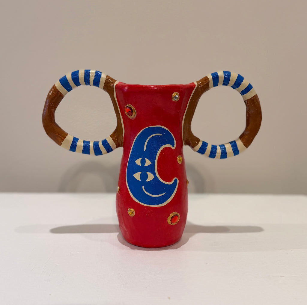 Small vessel with jewels - back view with moon design
