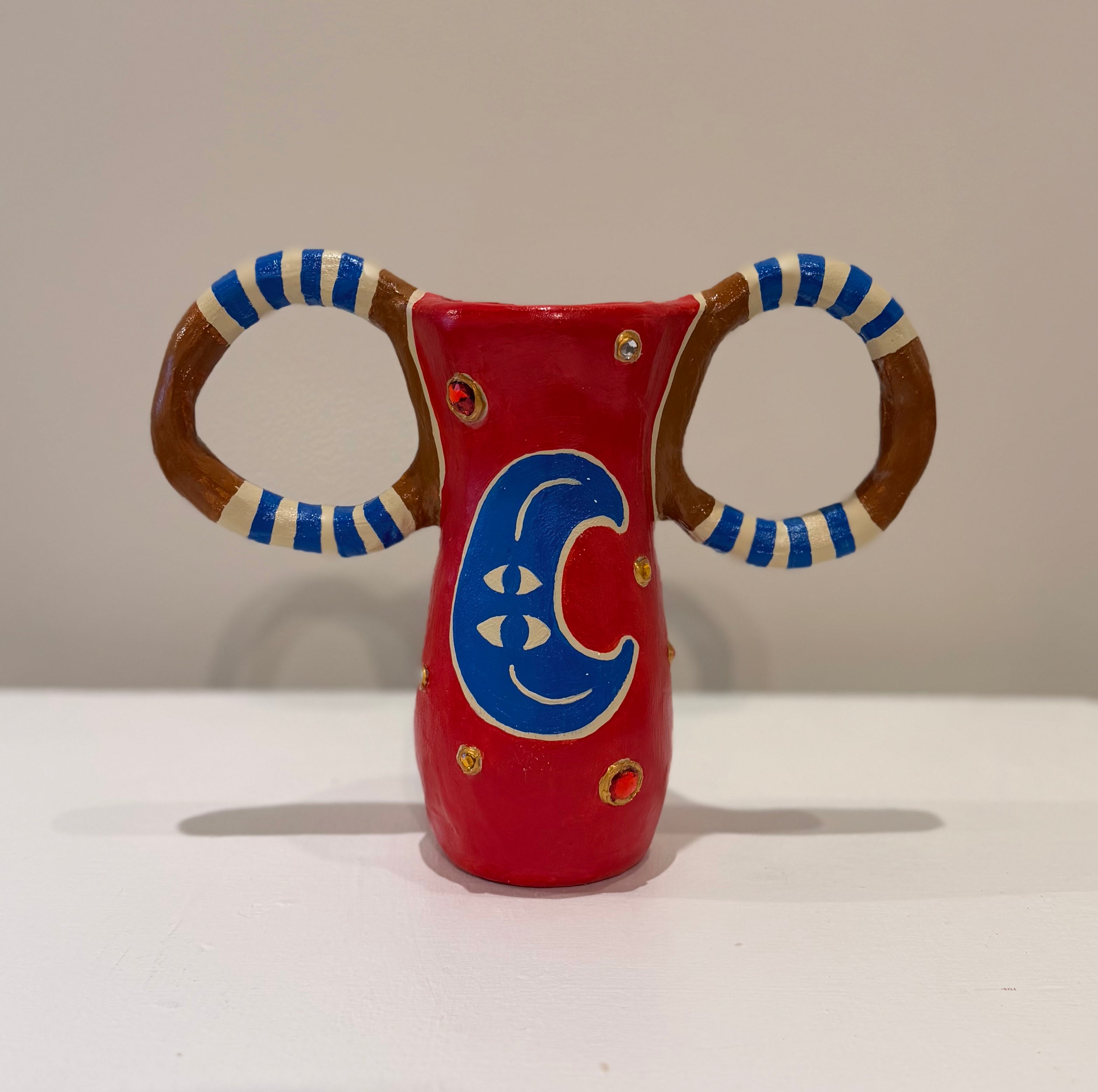 Small vessel with jewels - back view with moon design