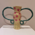 Medium vessel with flower design by Lori Lyon