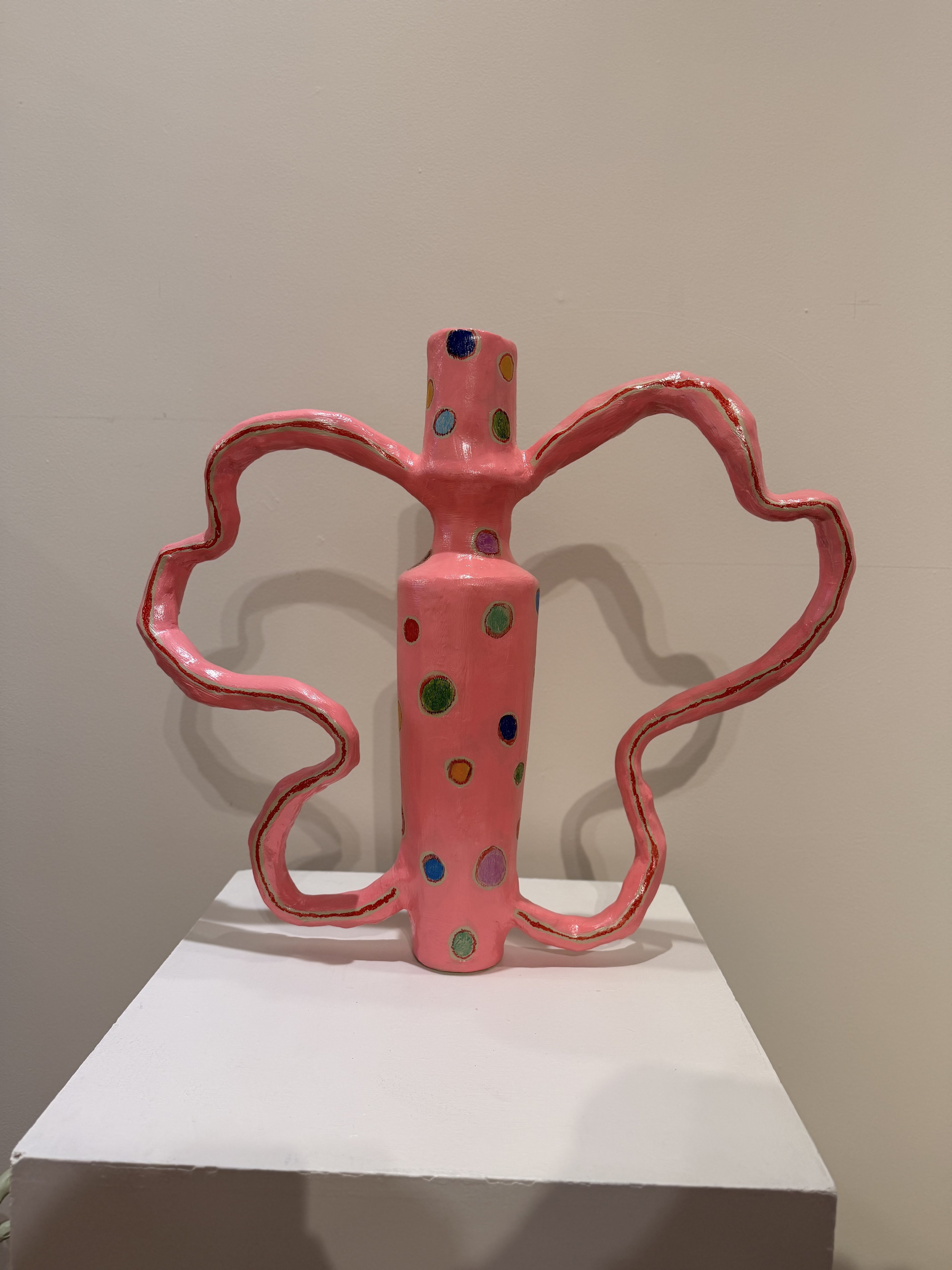Large pink vessel with wavy handles by Lori Lyon